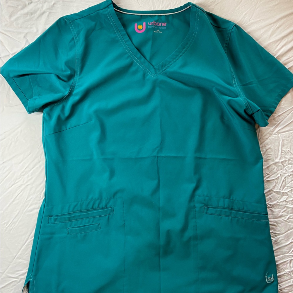 Urbane performance scrub top